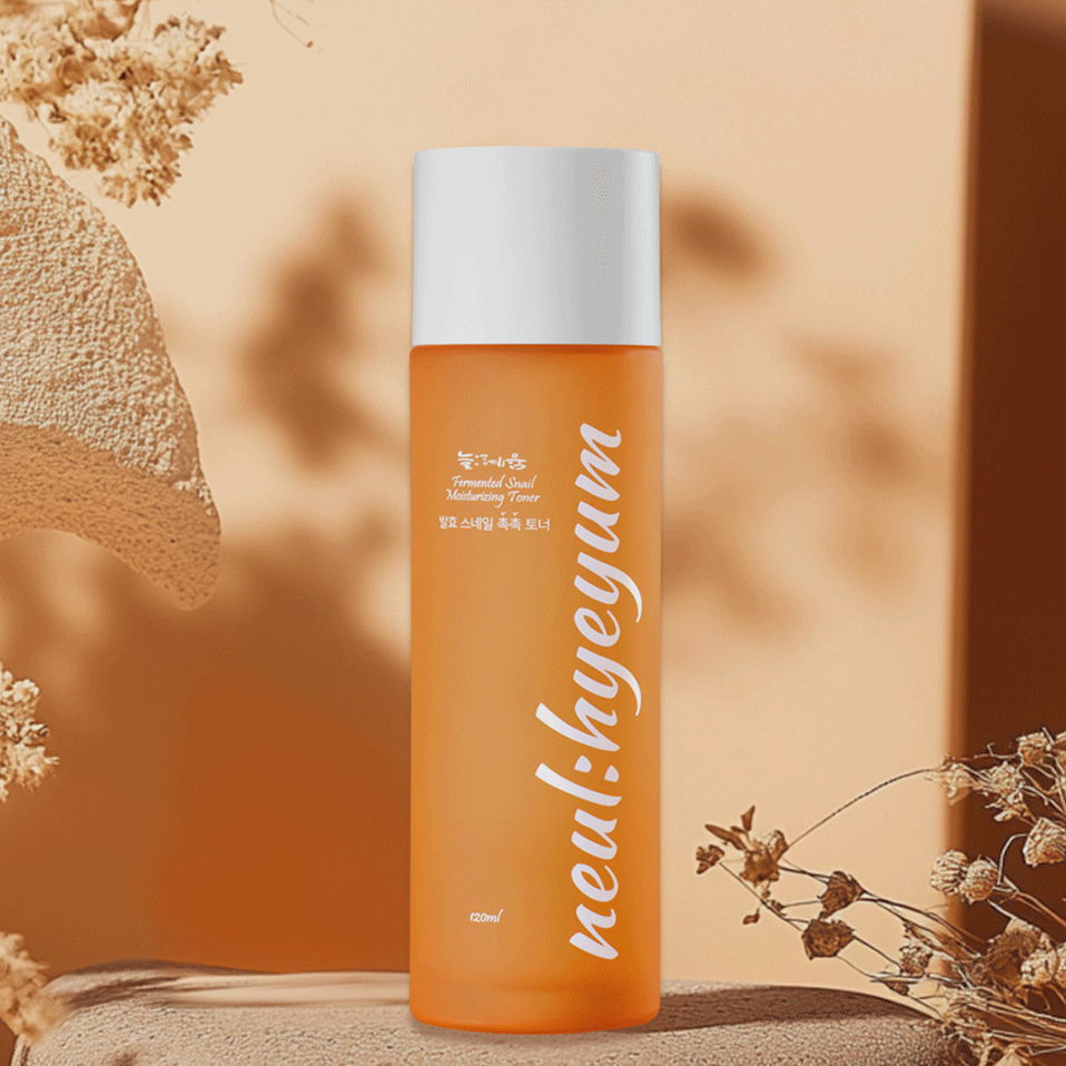 NEUL:HYEYUM Fermented Snail Moisturizing Toner in a Korean skincare routine flatlay with cotton pads and natural elements. Beautifulsmile cosmetics UK