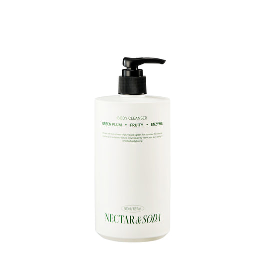Front view of the Green Plum Fruit Enzyme Body Cleanser bottle, showing the product name and green/plum-colored label design.