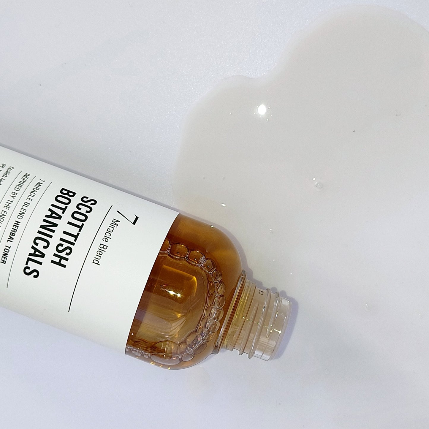 7 Miracle Blend Herbal Toner in plastic bottle, formulated with seven soothing herbal extracts