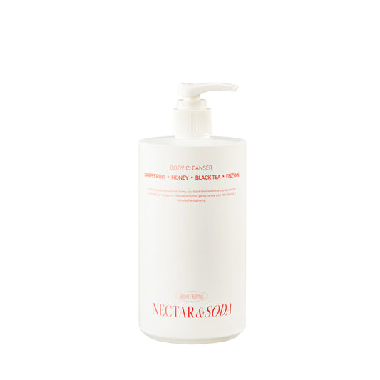 Green Plum Fruit Enzyme Body Cleanser bottle enriched with natural fruit enzymes to gently exfoliate and refresh the skin.