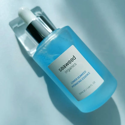 Hydrating seaweed essence in a sleek glass bottle with functional pump dispenser