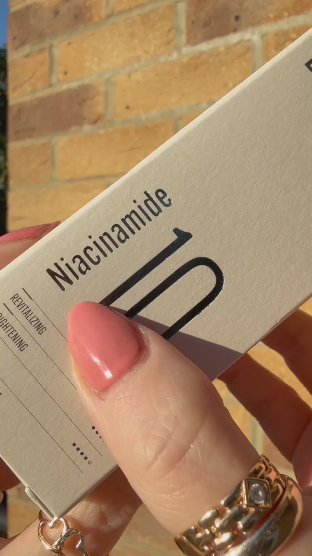 Applying D'ACT Niacinamide 10 Serum with dropper – lightweight K-beauty serum for even skin tone and pore care. Beautifulsmile cosmetics UK