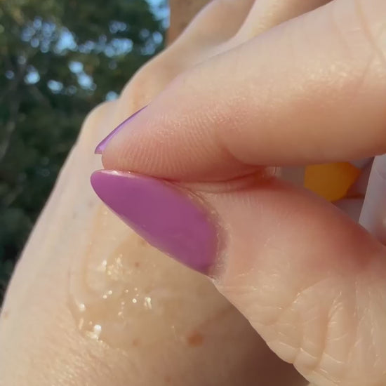Applying NEUL:HYEYUM Fermented Snail Tightening Serum – lightweight K-beauty serum for elasticity and skin tightening. Beautifulsmile cosmetics UK